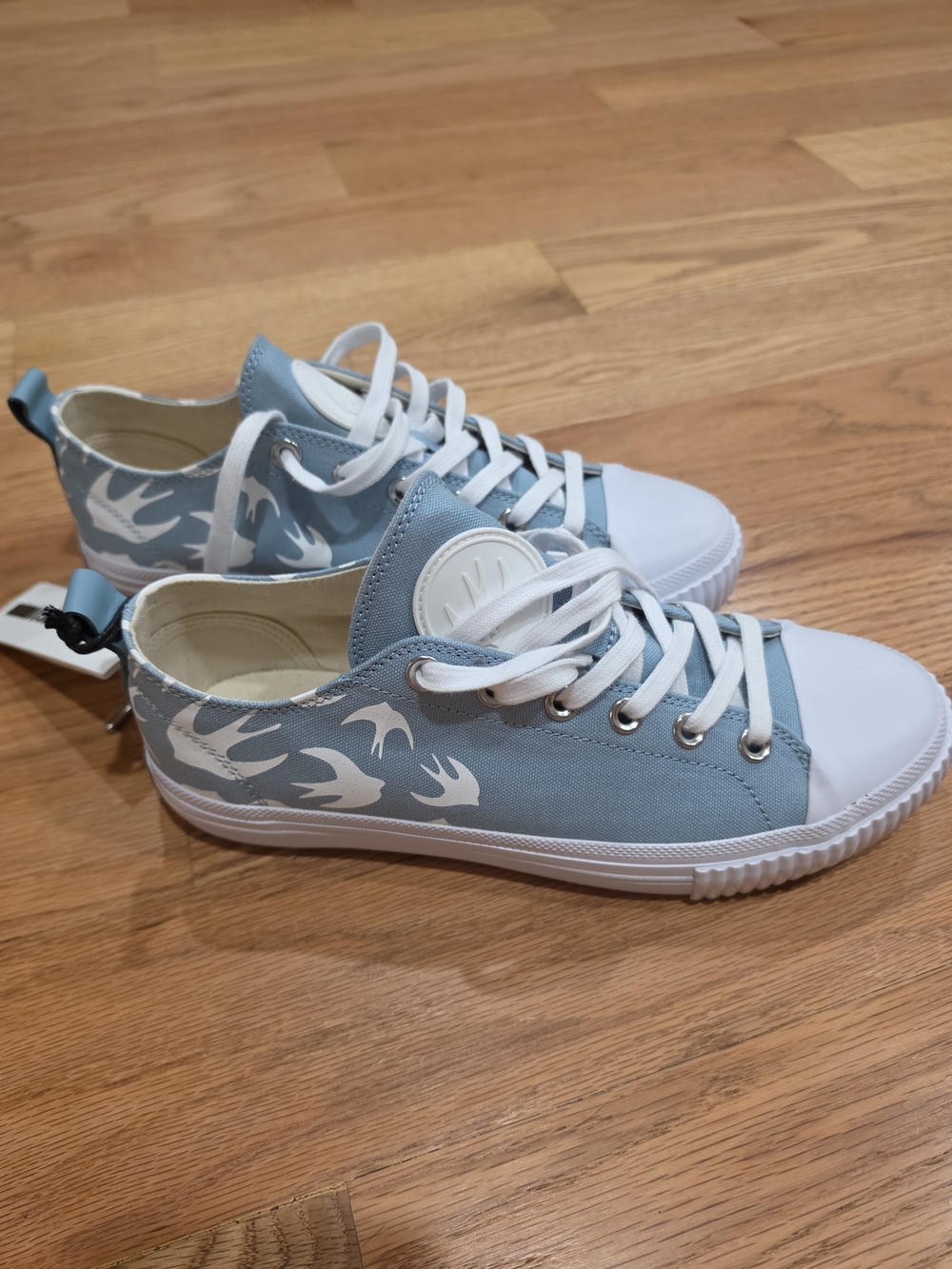 McQ by Alexander McQueen Light Blue Canvas Sneakers with White Swallow Print
